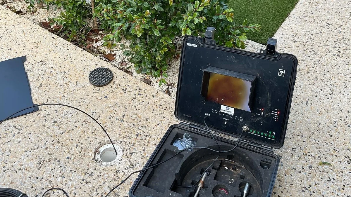 Stormwater drainage service Adelaide — CCTV drain camera inspection equipment deployed on residential property